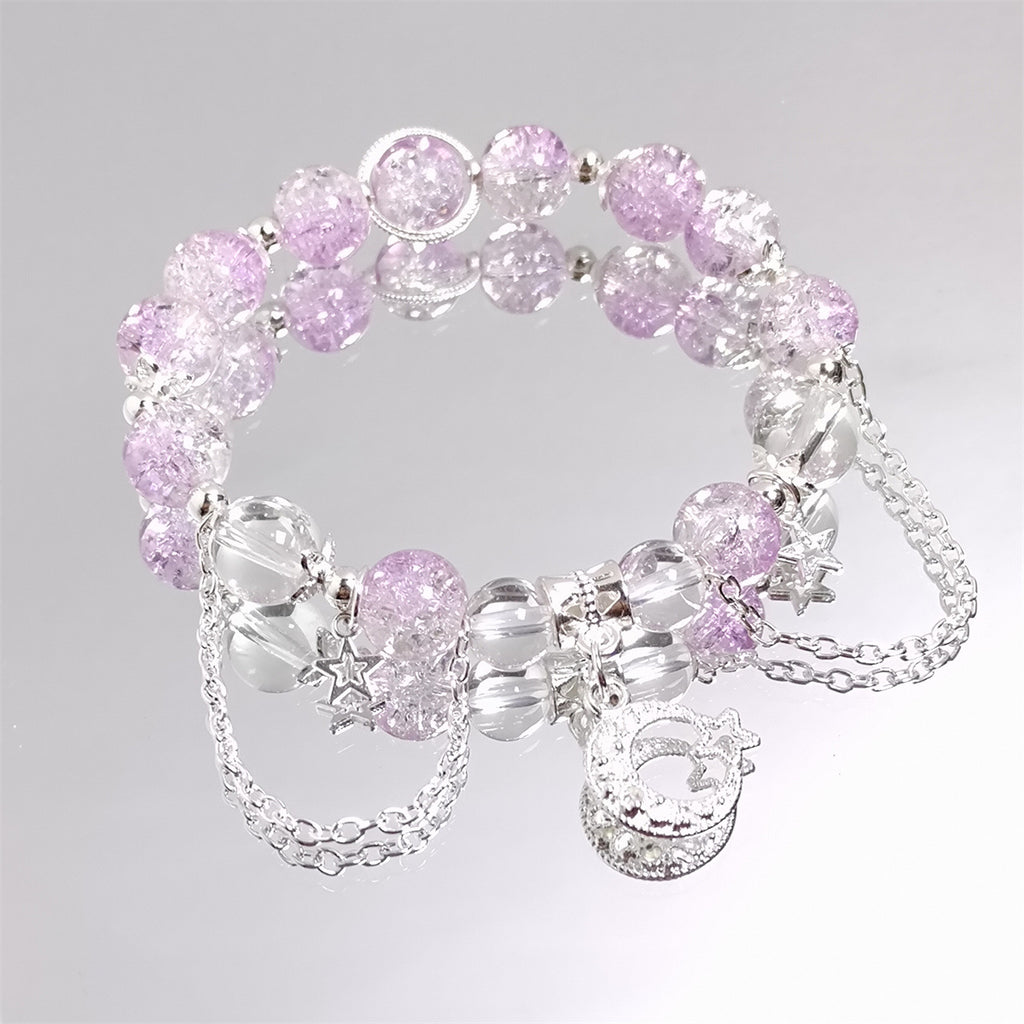 Damen Armband mit funkelnden Kristall-Elementen und charmanten Anhängern Shop Nory