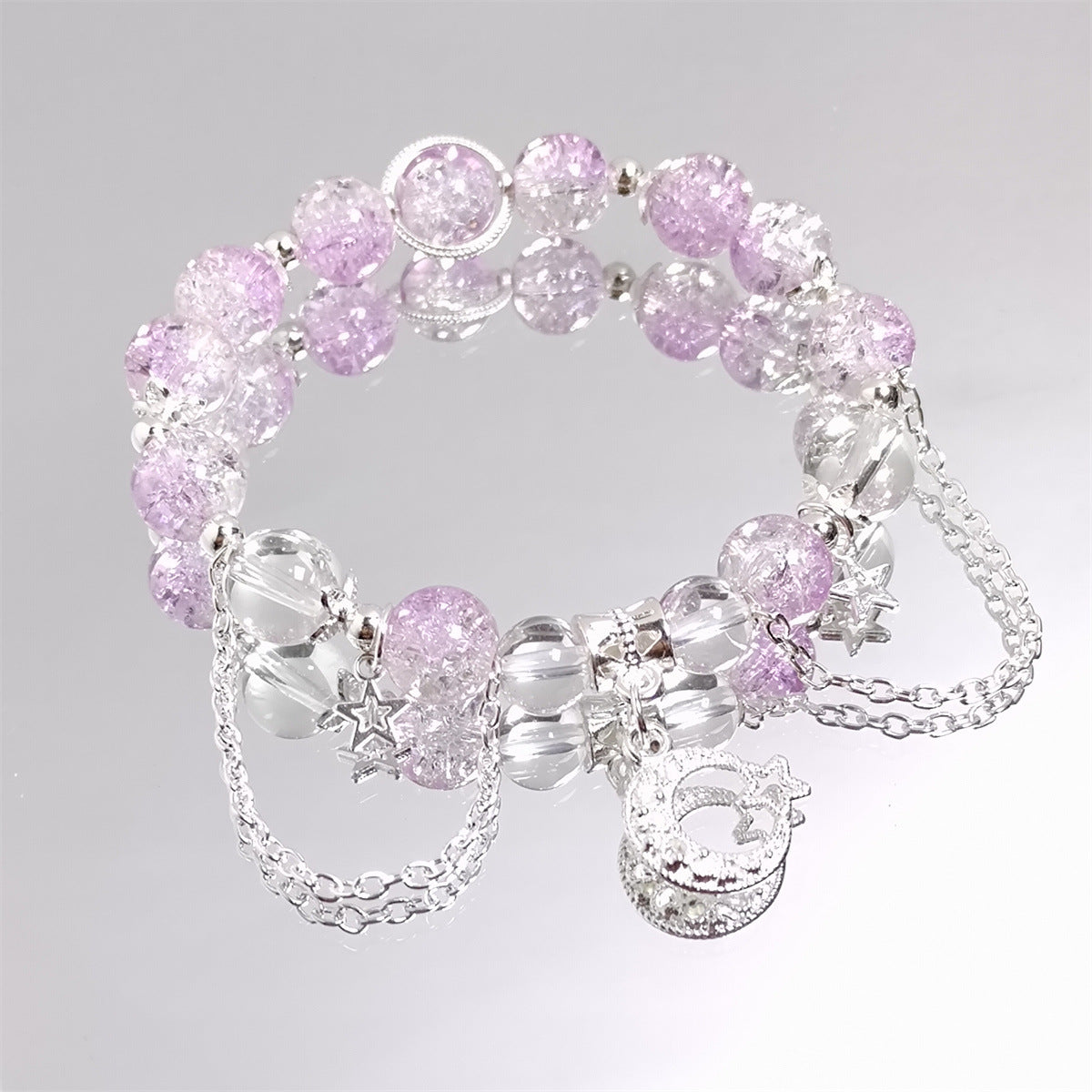Damen Armband mit funkelnden Kristall-Elementen und charmanten Anhängern Shop Nory