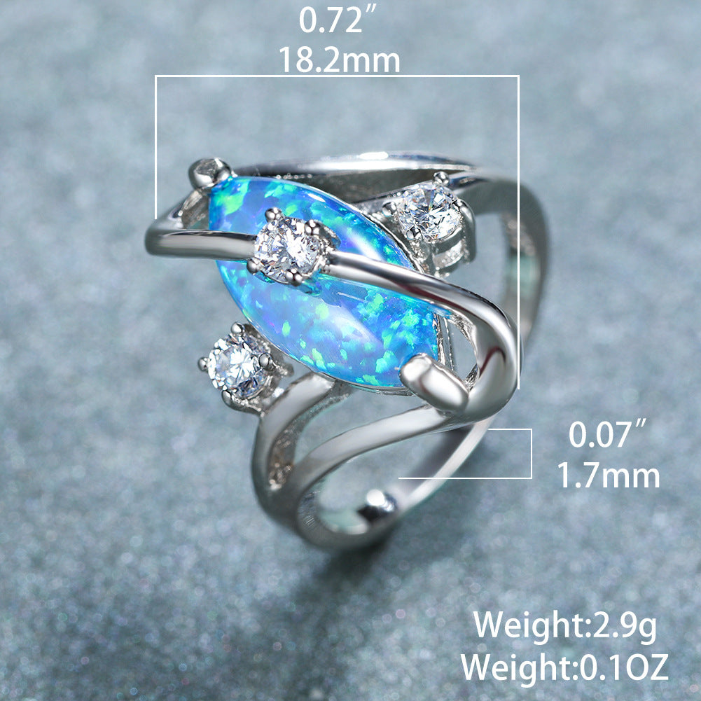Damen Ring mit funkelndem Opal und eleganten Zirkonia-Details Shop Nory