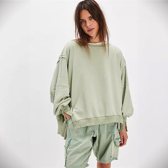 Damen oversized Sweatshirt mit Ballonärmeln, offenen Saumnähten und seitlichen Schlitzen Shop Nory