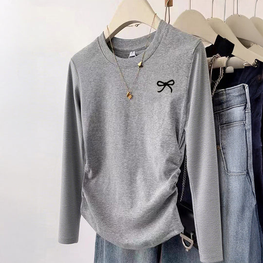 Damen nan gerüschtes Langarmshirt mit dezenter Schleifen-Stickerei und taillierter Drapierung Shop Nory