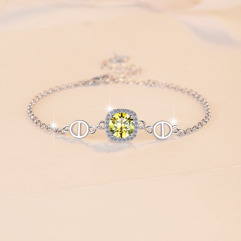 Damenarmband mit strahlend gelbem Kristall und funkelndem Zirkonia-Rahmen Shop Nory