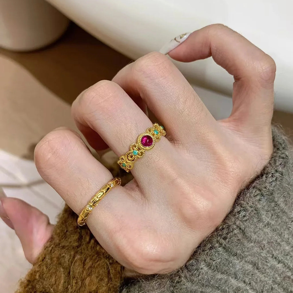 Damenring mit kunstvollem Design und buntem Edelstein Shop Nory