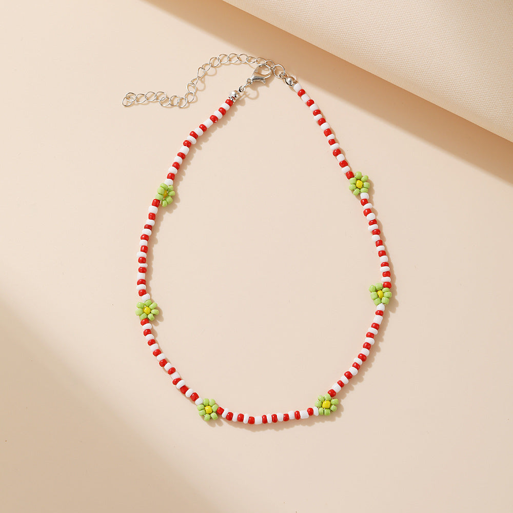 Damen feine Halskette mit goldfarbenen Akzenten und eleganten Glasperlen Shop Nory
