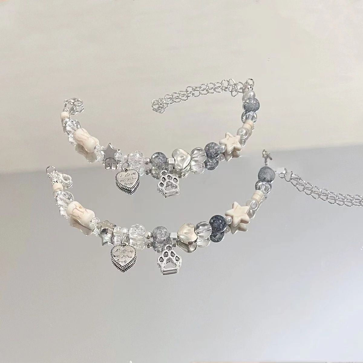 Damen Armband mit einzigartigen Charms und herzlichen Motiven Shop Nory