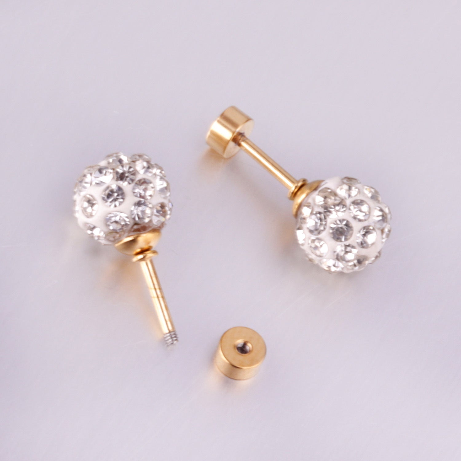 Damen Ohrstecker mit bunten Kristallen und goldplattierten Elementen Shop Nory