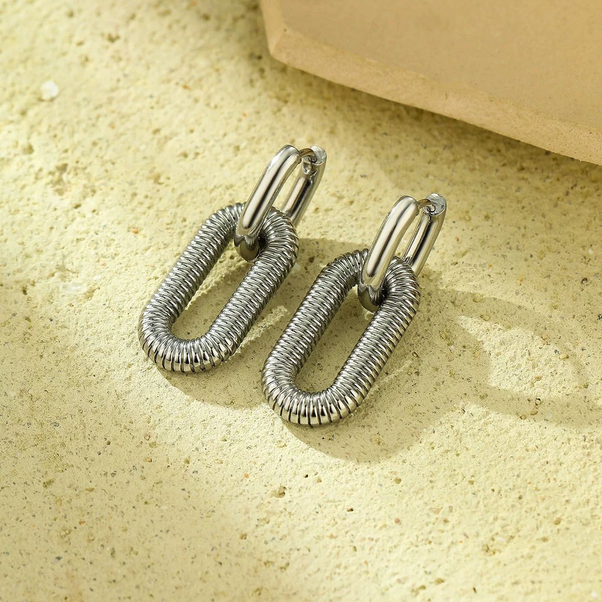 Frauen Statement Creolen Shop Nory