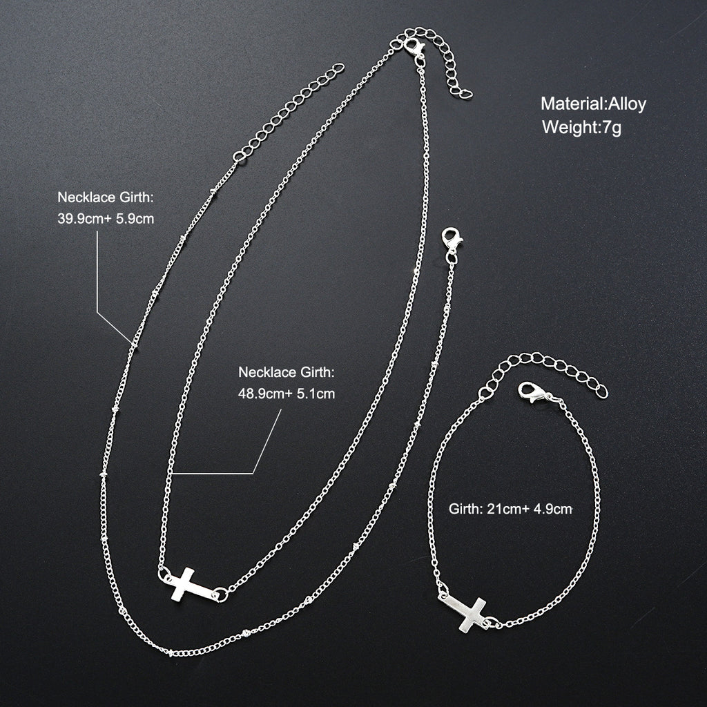 Damen mehrlagige Halskette und Armband-Set mit minimalistischen Kreuzanhängern Shop Nory