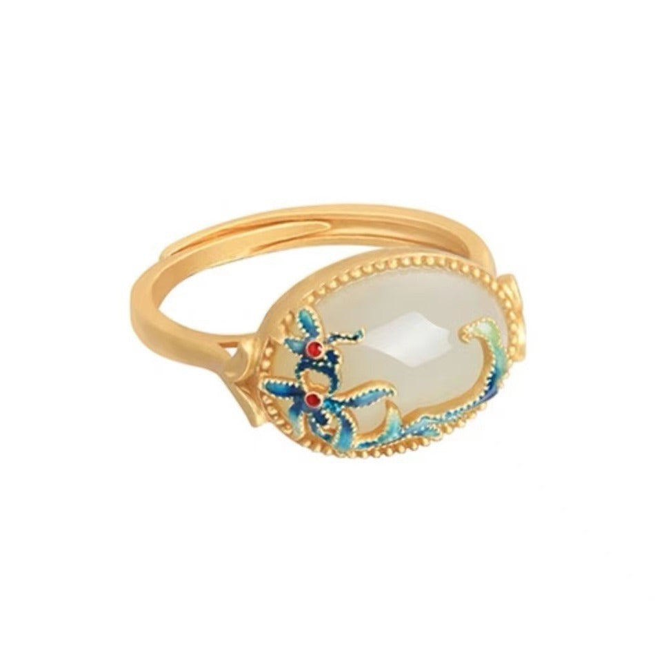 Damen Ring mit kunstvollem Blumenmuster aus goldfarbenem Metall Shop Nory