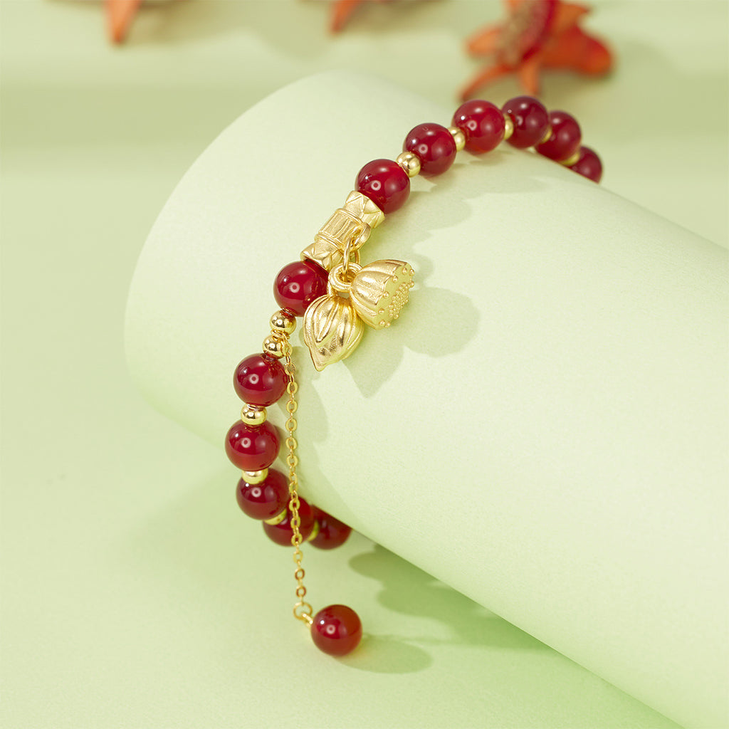 Damen Armband mit kunstvollen Anhängern und eleganten Perlenelementen Shop Nory
