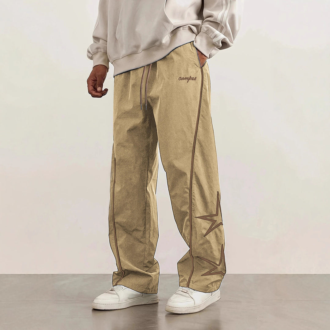 Herren Weite Trackpants mit Kontrastpaspel, Kordelzug und Sternapplikation Shop Nory