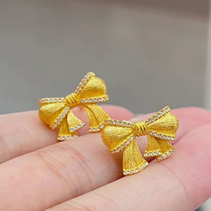 Damen Halskette mit funkelndem Schleifenanhänger Shop Nory