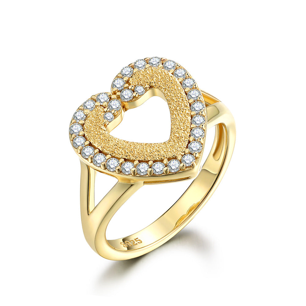 Damen Herz-Ring mit funkelnden Zirkonia und goldener Fassung Shop Nory