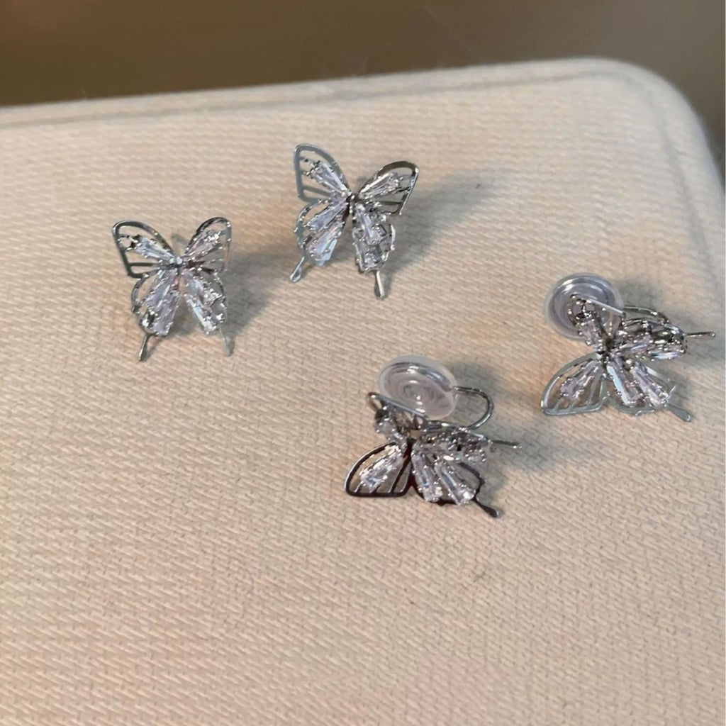 Damen Ohrringe im eleganten Schmetterlingsdesign mit funkelnden Kristallen Shop Nory