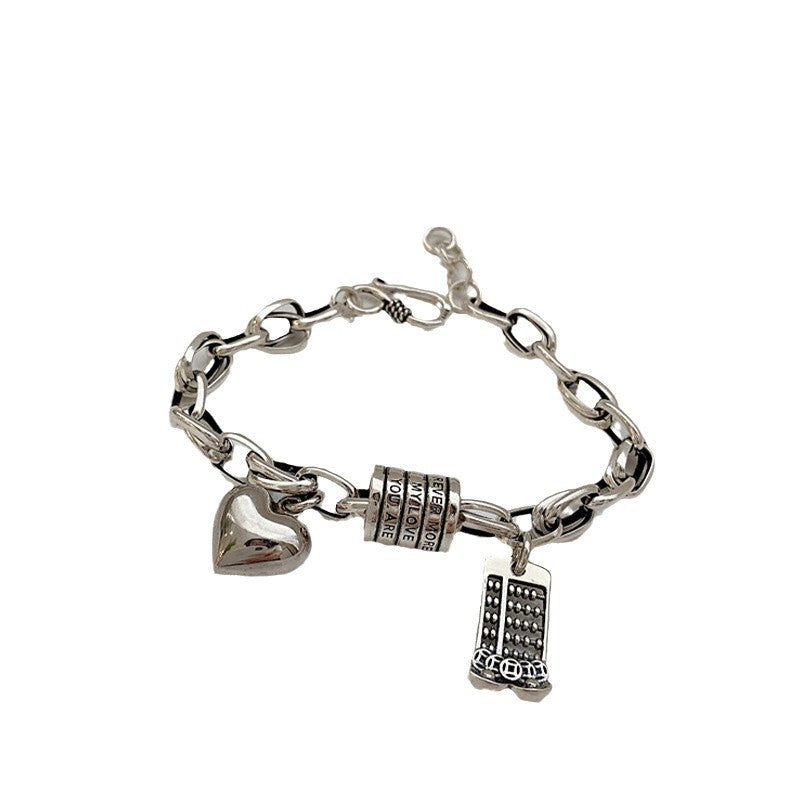 Damenarmband mit charmanten Anhängern Shop Nory