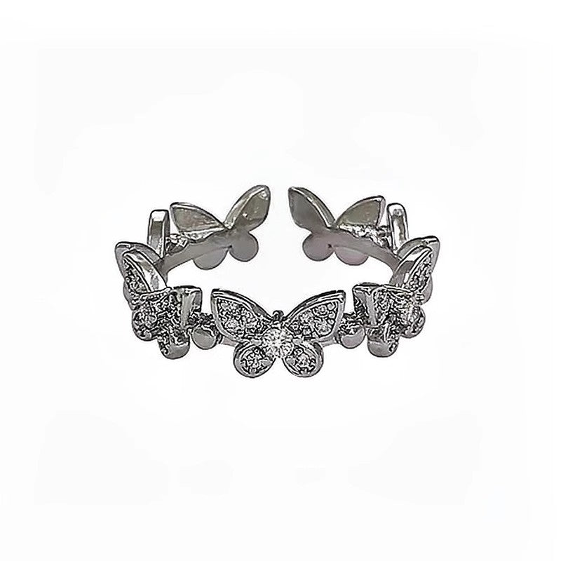 Damenring mit filigranem Schmetterlingsdesign und funkelnden Zirkonia Shop Nory