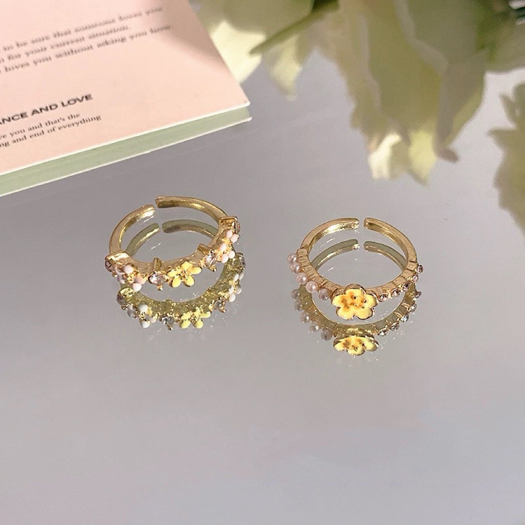 Damen Ring mit floralen Ziersteinen und funkelndem Design Shop Nory