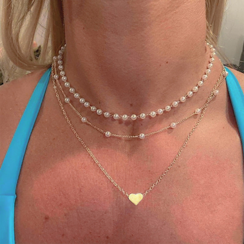 Damen mehrlagige Perlenhalskette mit Herzanhänger Shop Nory