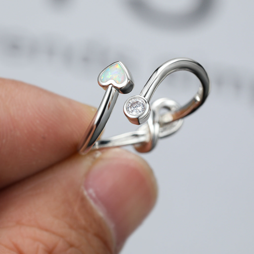 Damen Ring mit funkelndem Zirkonia und herzförmigem Opaleinsatz Shop Nory