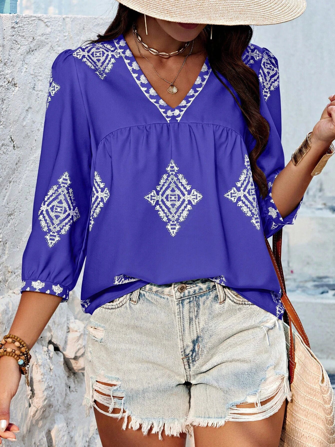 Damen Locker geschnittene Boho‑Bluse mit V‑Ausschnitt, geraffter Brustnaht und dreiviertelärmeln Shop Nory