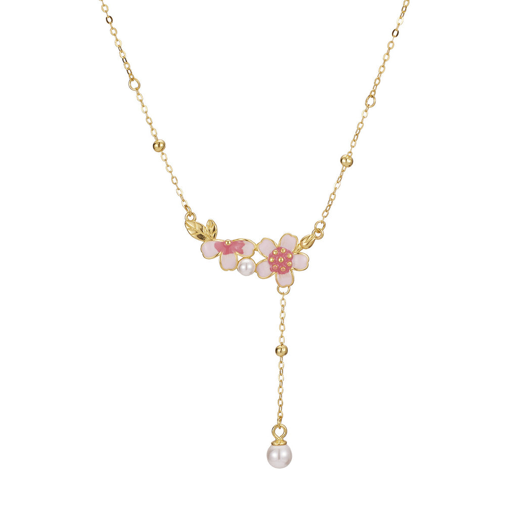 Damen filigrane Halskette mit floralen Anhängern und eleganter Perlenverzierung Shop Nory