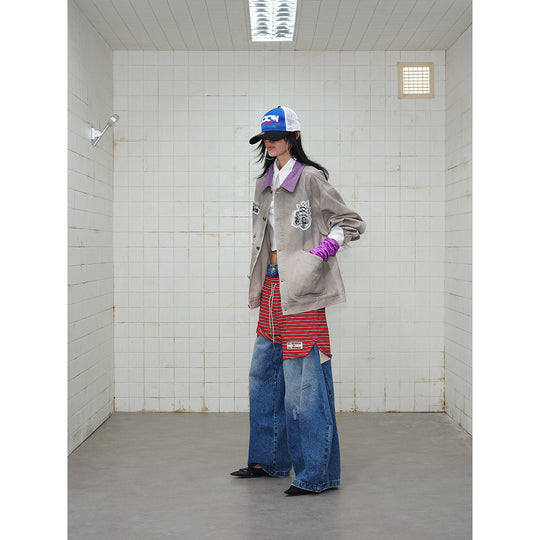 Unisex Kastig geschnittene Chorejacke aus Baumwollcanvas mit artistischen Patch Applikationen und Cordkragen Shop Nory