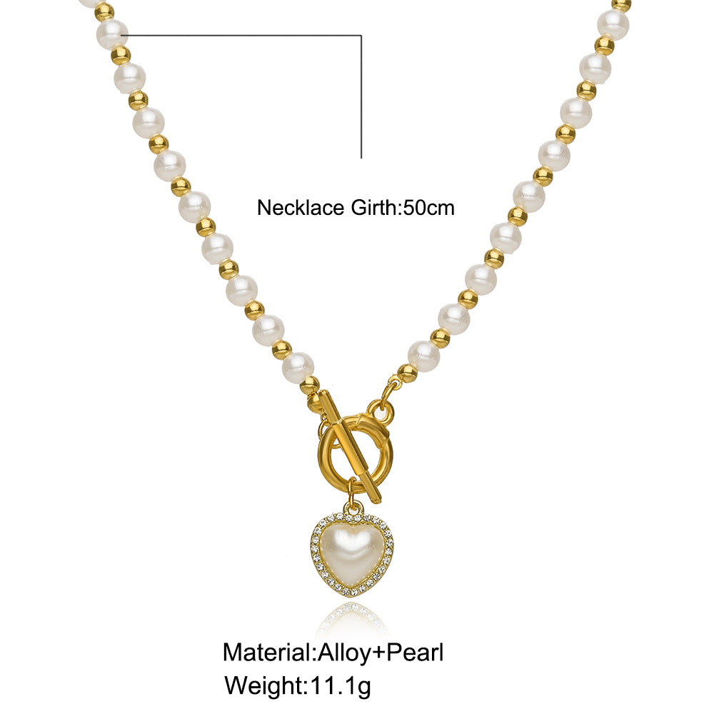 Damen Halskette mit Perlen und Herzanhänger Shop Nory