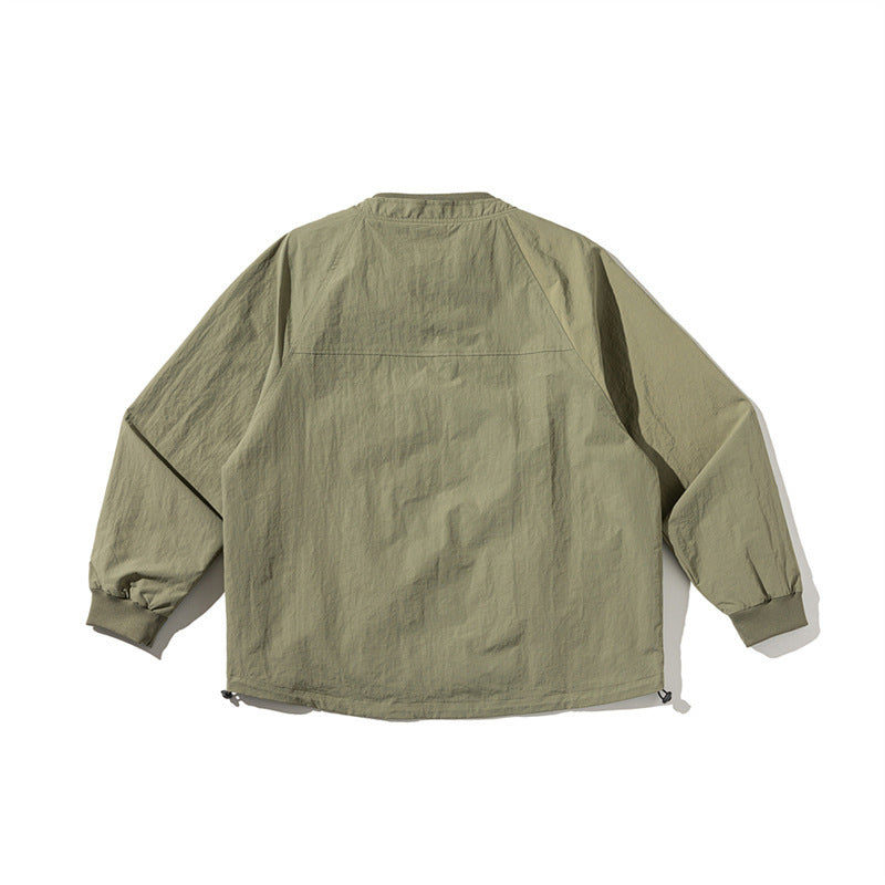 Unisex Leichte Boxy-Fieldjacke ohne Kragen mit Raglanärmeln, aufgesetzten Klappentaschen und Kordelzug Shop Nory