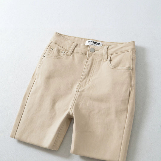 Damen Highwaist-Schlaghose aus Stretch-Denim mit fünf Taschen und rohem Saum Shop Nory