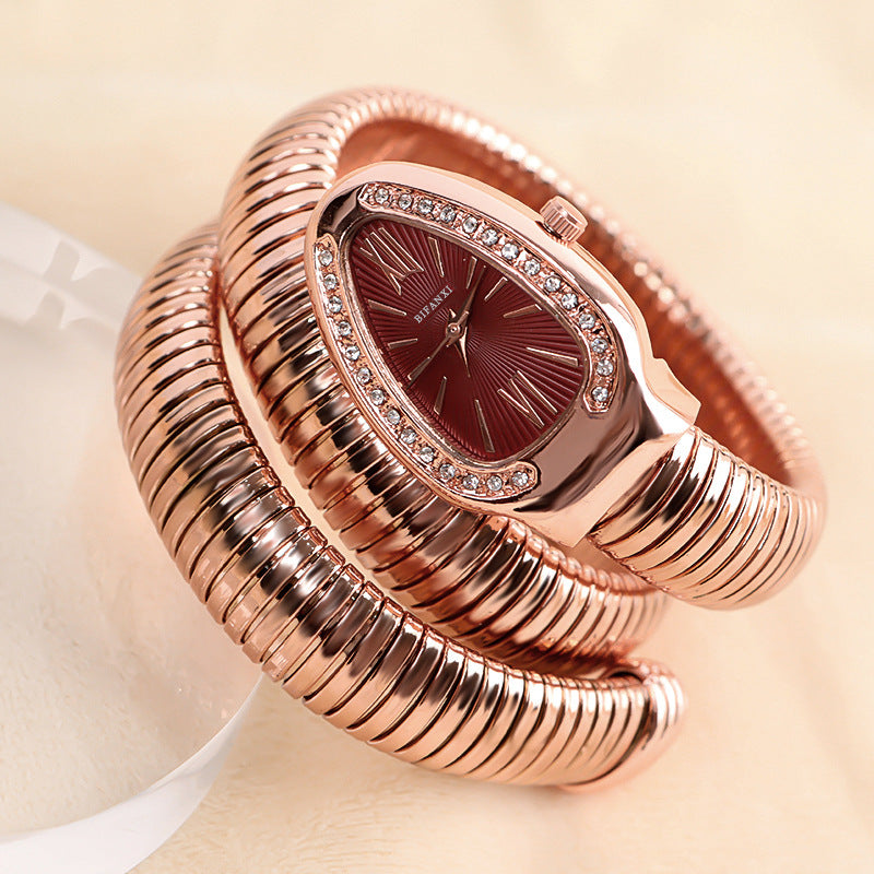 ShopNory | Schlangenuhr mit Quarzbewegung und Persönlichem Armband