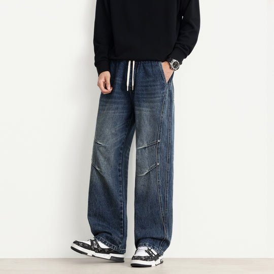 Herren Weite Denim-Hose mit Tunnelzugbund, Paneelnähten und Used-Waschung Shop Nory