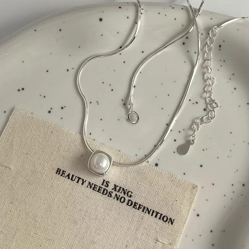 Damen Halskette mit zeitlosem Perlenanhänger und elegantem Silberminimalismus Shop Nory