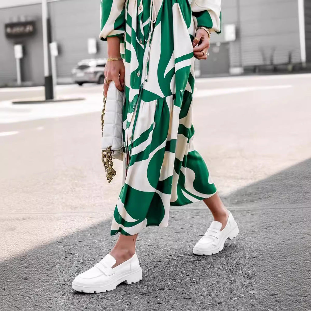 Damen Maxikleid mit modernem Muster und praktischem Taillengürtel