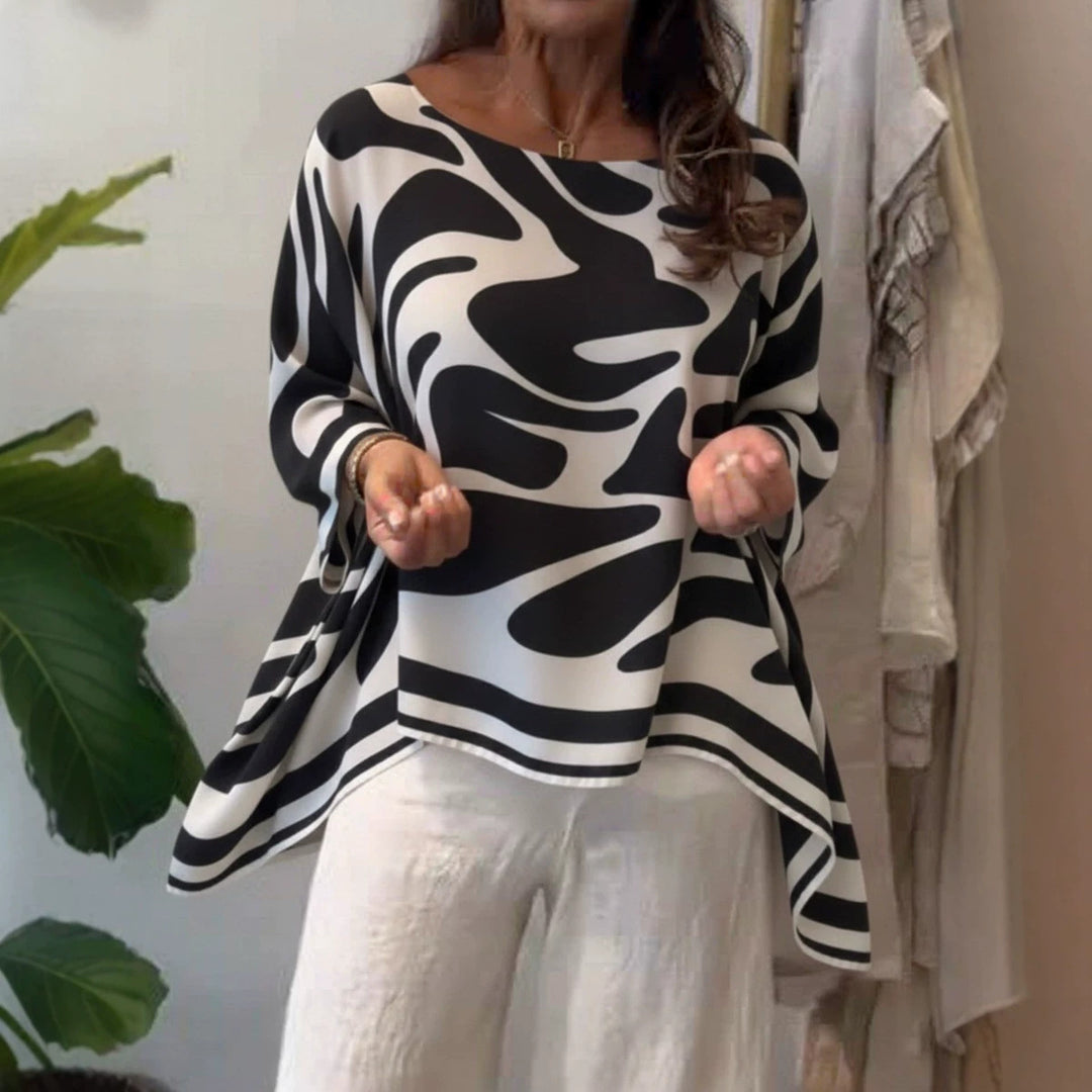 Damen Oversize Sommerbluse mit abstraktem Print, Fledermausärmeln und asymmetrischem Saum Shop Nory