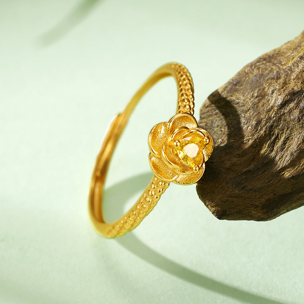 Damen Ring mit blütenförmigem Schmuckdesign und funkelndem gelbem Edelstein Shop Nory