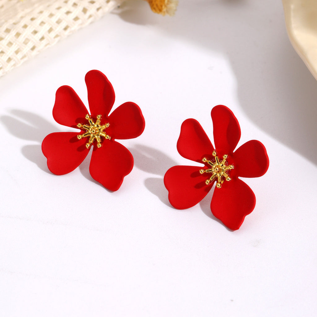 Damen Ohrringe im floralen Design mit glanzvollem goldenen Akzent Shop Nory
