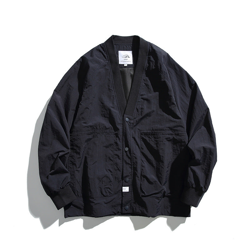 Unisex Weitgeschnittene Leichte Übergangsjacke mit V-Ausschnitt und Druckknopfleiste Shop Nory