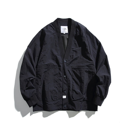 Unisex Weitgeschnittene Leichte Übergangsjacke mit V-Ausschnitt und Druckknopfleiste Shop Nory