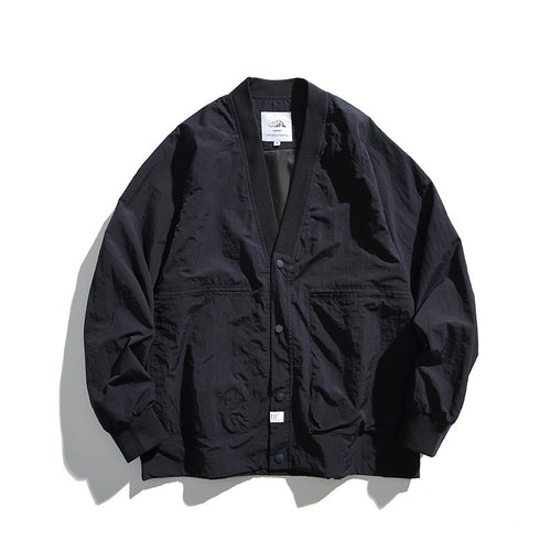 Unisex Weitgeschnittene Leichte Übergangsjacke mit V-Ausschnitt und Druckknopfleiste Shop Nory