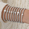 Damen Armband-Set mit charmanten Anhängern und stylischem Design Shop Nory