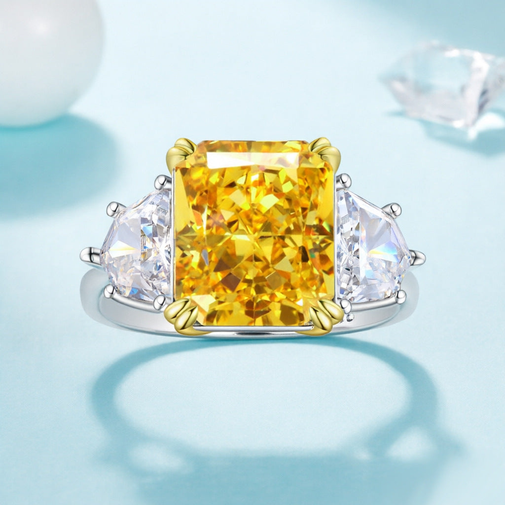 Damenring mit extravagantem, rechteckigem Hauptstein und funkelnden Zirkonia-Shop Nory