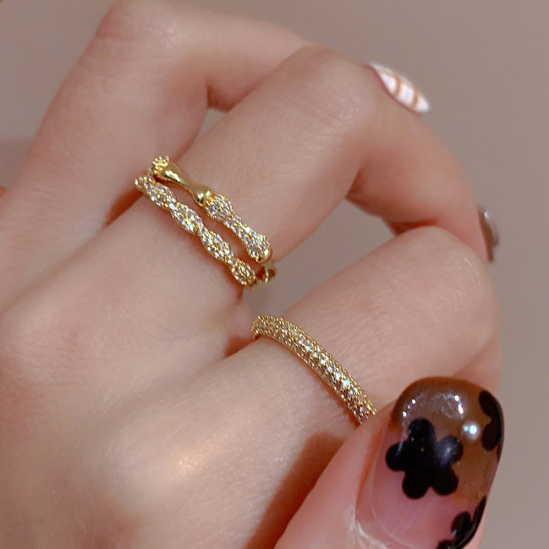 Damen zierlicher Goldring mit kunstvollem Flechtmuster Shop Nory