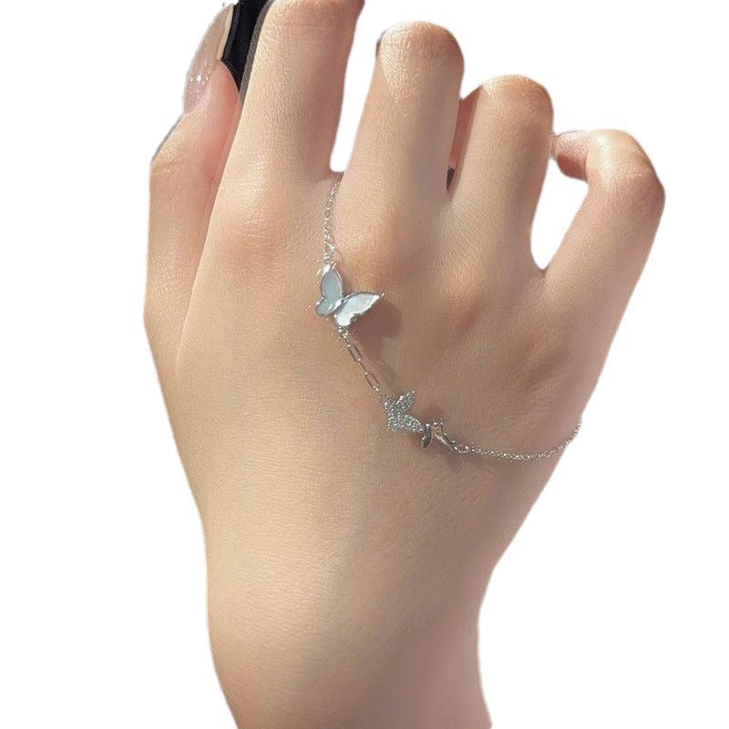 Damenarmband mit filigranem Schmetterlingsdesign und funkelnden Zirkonia Shop Nory