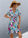 Damen Wickelkleid mit floralem Muster und schwingendem Rock
