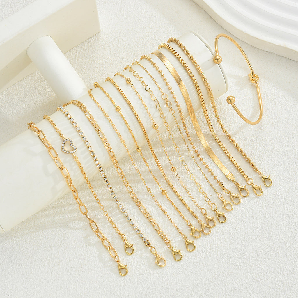 Damen Armband-Set mit glänzenden Gold- und zarten Perlendetails Shop Nory