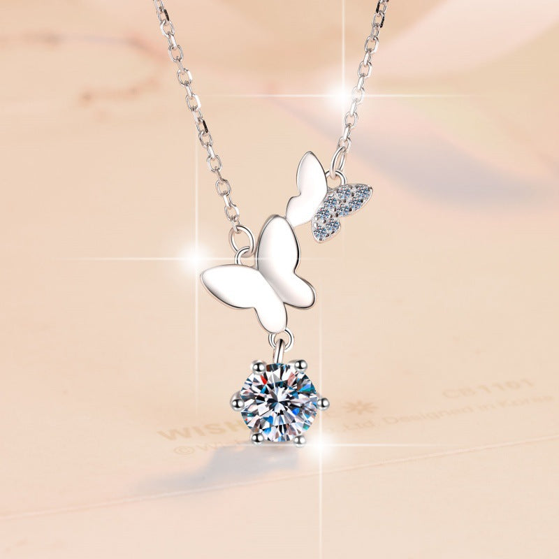 Damen Halskette mit filigranen Schmetterlingsanhängern und funkelndem Kristall Shop Nory
