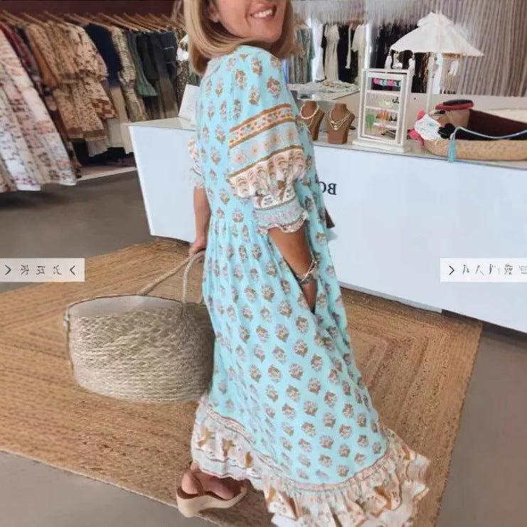 Frauen Boho Maxi Kleid aus leichtem Viskose-Mix mit V-Ausschnitt, Quastenbändchen, drei Viertelärmeln und seitlichen Taschen Shop Nory