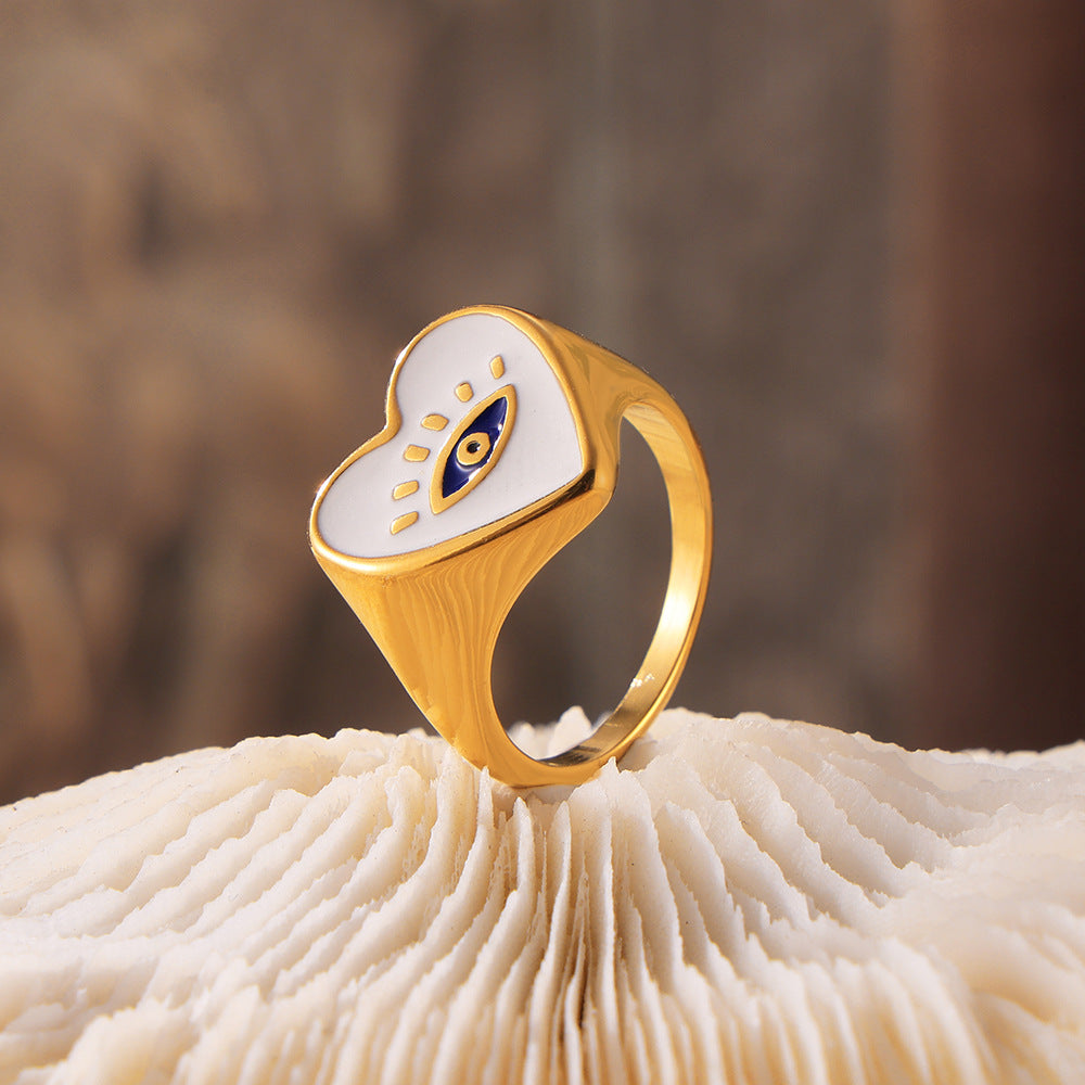 Damenring mit herzförmigem Design und Eye-Emblemen Shop Nory