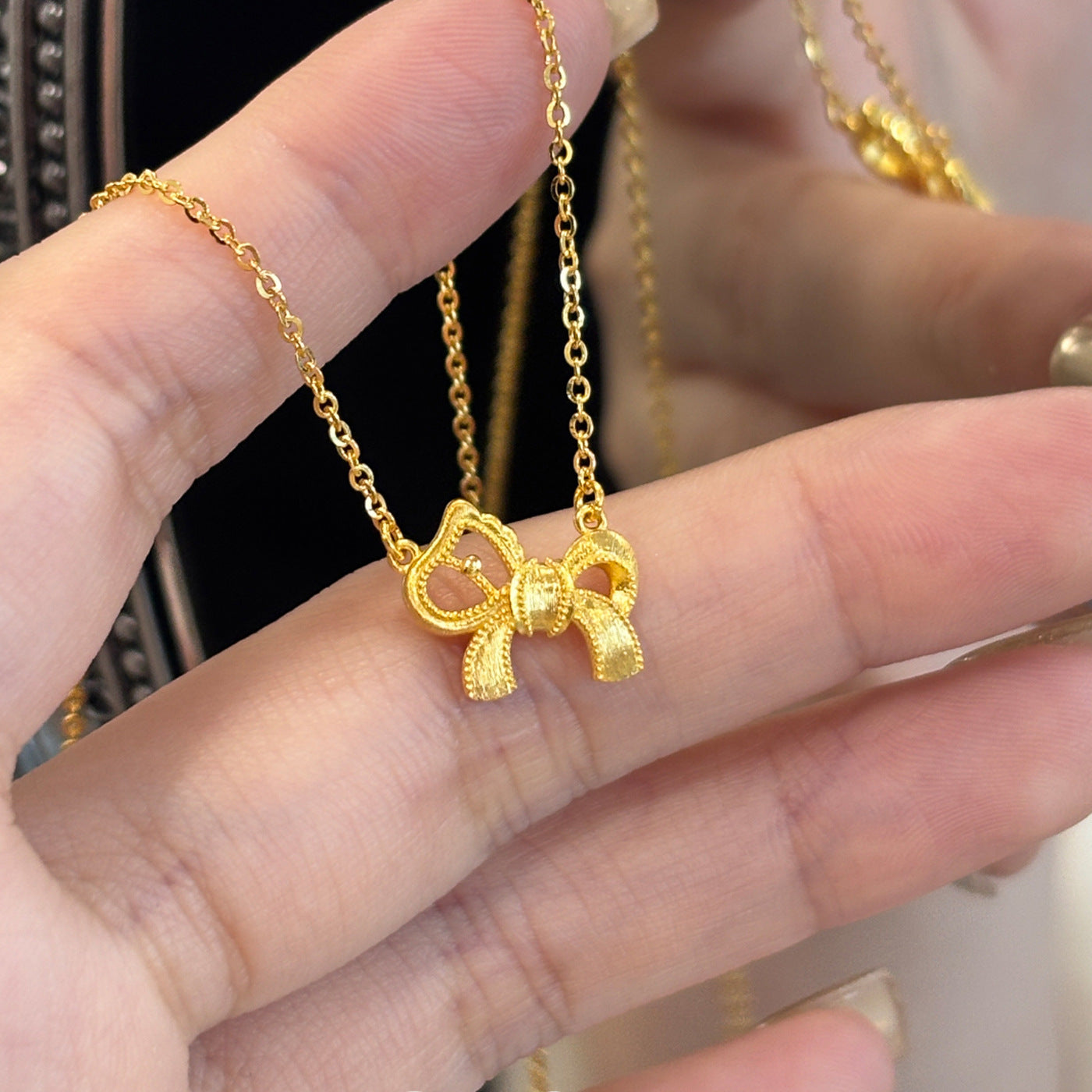 Damen Halskette mit elegantem Schleifenanhänger aus hochwertigem Edelstahl Shop Nory
