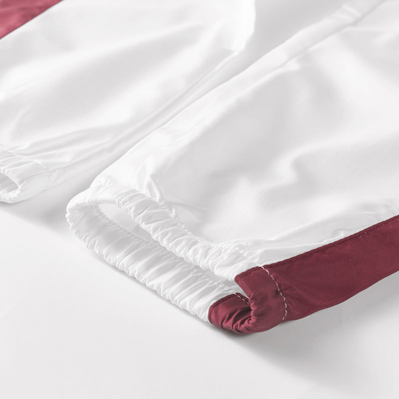 Herren Sportives Freizeit-Trainingsanzug-Set aus leichtem Windbreaker-Material mit Kontraststreifen und reflektierenden Einsätzen Shop Nory